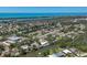 Coastal aerial shot showcasing the neighborhood's waterfront access and lush green surroundings at 4624 Pompano St, Placida, FL 33946