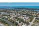 Expansive aerial view of the waterfront neighborhood, highlighting the coastal setting and community layout at 4624 Pompano St, Placida, FL 33946