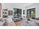 Bright living room with natural light, a modern aesthetic and sleek workout bike at 4624 Pompano St, Placida, FL 33946