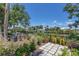 Outdoor bar area with garden views providing the perfect setting for relaxation and entertainment at 4624 Pompano St, Placida, FL 33946
