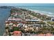 Aerial view of condominiums located on a barrier island with bay and ocean access at 5055 N Beach Rd # 208, Englewood, FL 34223