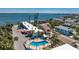 Beautiful waterfront condo with a swimming pool and well manicured tropical landscaping at 5055 N Beach Rd # 208, Englewood, FL 34223