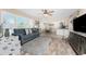 Cozy living room flows seamlessly to the kitchen and dining area with lots of natural light at 5055 N Beach Rd # 208, Englewood, FL 34223