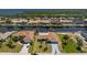 Aerial view of the property featuring a waterfront location with access to canals and neighboring homes at 5232 Conner Ter, Port Charlotte, FL 33981