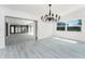 Dining area featuring new flooring and views of screened-in patio at 5232 Conner Ter, Port Charlotte, FL 33981