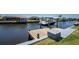 Dock with a boat lift on the canal with easy boating access to the gulf at 5232 Conner Ter, Port Charlotte, FL 33981