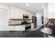 Updated kitchen with stainless steel appliances, granite countertops, and ample cabinetry at 5232 Conner Ter, Port Charlotte, FL 33981