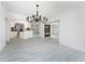 Open-concept living space that integrates the living, dining, and kitchen areas seamlessly at 5232 Conner Ter, Port Charlotte, FL 33981