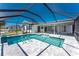 View of the pool with covered lanai provides comfort and space for entertainment at 5232 Conner Ter, Port Charlotte, FL 33981