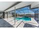 Inviting screened-in pool area for relaxation and enjoyment of the Florida lifestyle and canal views at 5232 Conner Ter, Port Charlotte, FL 33981