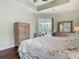 Well-lit bedroom with backyard views and wood floors at 5433 White Ibis Dr, North Port, FL 34287