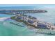 Panoramic aerial view of island condos with beach access, docks, and the Intercoastal Waterway at 6030 Boca Grande Cswy # B21, Boca Grande, FL 33921