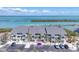 Beautiful exterior of condo building offering beachfront access and parking at 6030 Boca Grande Cswy # B21, Boca Grande, FL 33921