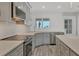 Modern kitchen featuring stainless steel appliances and attractive countertops at 6030 Boca Grande Cswy # B21, Boca Grande, FL 33921