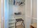 Neatly organized closet with shelves, hanging rods, and a luggage rack at 6181 Jack St, Venice, FL 34293