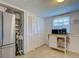 Well-equipped kitchen with stainless steel refrigerator and ample cabinet space at 6181 Jack St, Venice, FL 34293