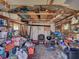 Organized storage shed interior featuring shelving and ample space at 6181 Jack St, Venice, FL 34293