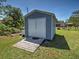Exterior view of a shed with painted siding and double doors at 6181 Jack St, Venice, FL 34293