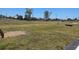 Community horseshoe pits in a grassy area, perfect for outdoor activities at 6540 Coliseum Blvd, Port Charlotte, FL 33981