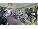 Bright living room with vaulted ceilings, comfortable seating, and an open floor plan at 6540 Coliseum Blvd, Port Charlotte, FL 33981
