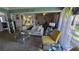 Bright living room with vaulted ceilings, comfortable seating, and an open floor plan at 6540 Coliseum Blvd, Port Charlotte, FL 33981
