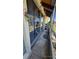 Enclosed sunroom with screened walls and plants at 6540 Coliseum Blvd, Port Charlotte, FL 33981