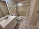 Standard bathroom with shower, toilet, and sink with vanity at 6800 Placida Rd # 1004, Englewood, FL 34224