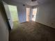 Cozy bedroom featuring carpet flooring, a ceiling fan, and a closet to maximize space at 6800 Placida Rd # 1004, Englewood, FL 34224