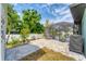 Beautiful backyard with a paved patio and a screened-in pool enclosure at 7108 Harle Ave, North Port, FL 34291