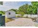 Well-maintained backyard featuring a shed and a paved patio at 7108 Harle Ave, North Port, FL 34291