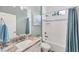 Charming bathroom featuring a marble vanity, bathtub, and stylish decor at 7108 Harle Ave, North Port, FL 34291