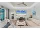 An open-concept living room featuring a large TV at 7108 Harle Ave, North Port, FL 34291