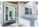 Bright entryway with a glass door, light blue walls, and a view of the dining area at 7466 Palm Island Dr # 2913, Placida, FL 33946