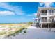 Beautiful beachside property with elevated balconies, offering stunning ocean views and direct beach access at 7466 Palm Island Dr # 2913, Placida, FL 33946