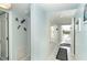 Hallway with marble tile, light blue walls, and doorways leading to different rooms at 7466 Palm Island Dr # 2913, Placida, FL 33946