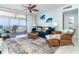 Cozy living room with stylish furniture, ocean view, and coastal decorations, perfect for relaxing by the sea at 7466 Palm Island Dr # 2913, Placida, FL 33946
