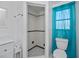 Bright bathroom featuring a tiled shower, white vanity, and modern fixtures at 81 Oakland Hills Pl, Rotonda West, FL 33947