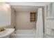 The bathroom features neutral tiling and tub-shower combo at 81 Oakland Hills Pl, Rotonda West, FL 33947
