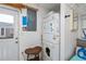 Functional laundry room with stacked washer and dryer units at 81 Oakland Hills Pl, Rotonda West, FL 33947