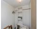 Walk-in closet with built-in shelves and hanging rods for ample storage at 81 Oakland Hills Pl, Rotonda West, FL 33947