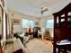 This bedroom features lots of natural light, a ceiling fan and a bunk bed at 8714 King St, Placida, FL 33946