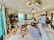 Cozy kitchen and dining area with beach view, white cabinets, and natural light at 8714 King St, Placida, FL 33946