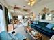 Comfortable living room with open floor plan, coastal accents, and bright interior at 8714 King St, Placida, FL 33946