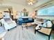 Inviting living room with coastal decor, comfortable seating, and natural light at 8714 King St, Placida, FL 33946