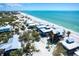 Aerial view of stunning beachfront homes with direct beach access and ocean views at 8812 Grand Ave, Placida, FL 33946