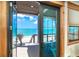 Spectacular view of a white sand beach from an outdoor balcony at 8812 Grand Ave, Placida, FL 33946