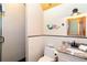 Updated bathroom with a tiled shower, granite countertop, and stylish vanity at 8812 Grand Ave, Placida, FL 33946