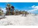 Beautiful beach houses on stilts, offering stunning views and beach access at 8812 Grand Ave, Placida, FL 33946