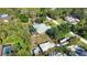 Aerial shot highlighting the property's yard, convenient RV parking, and storage shed at 941 Elwood Ave, Englewood, FL 34223
