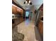 Beautiful kitchen features stainless steel appliances, granite countertops, and tiled flooring at 941 Elwood Ave, Englewood, FL 34223